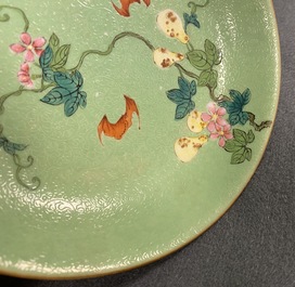 A pair of Chinese famille rose lime green-ground sgraffiato saucer dishes, Qianlong mark and of the period